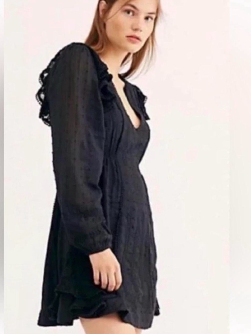 Free People Isabella Mini Dress is a black